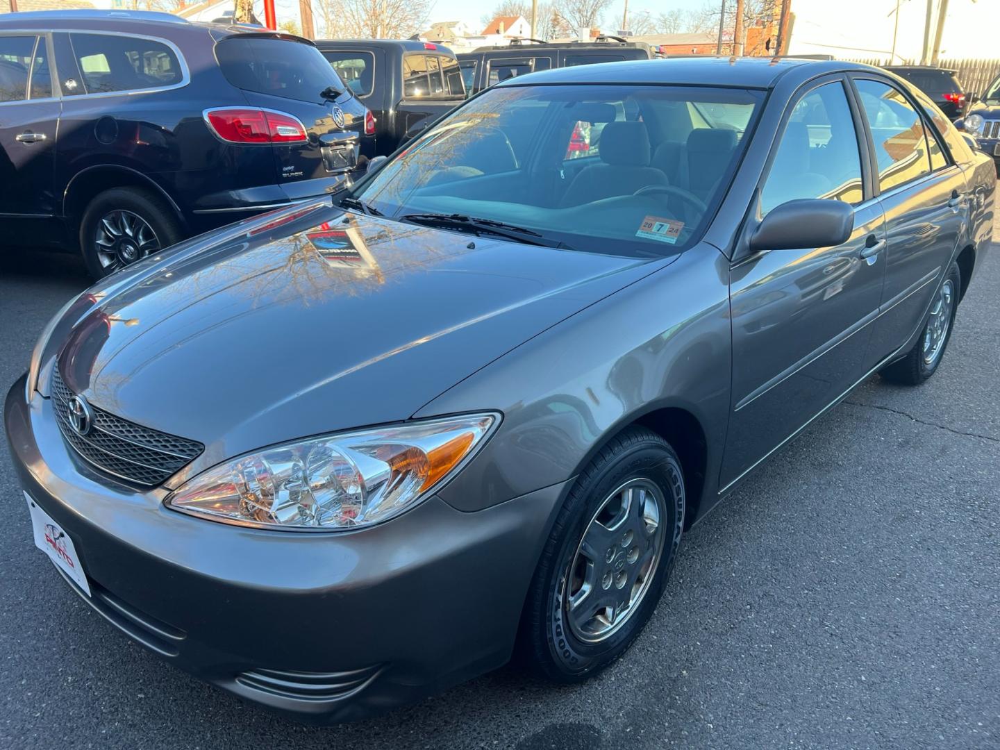 2003 charcoal /beige Toyota Camry LE (4T1BE32K63U) with an 2.4L L4 DOHC 16V engine, located at 1018 Brunswick Ave, Trenton, NJ, 08638, (609) 989-0900, 40.240086, -74.748085 - Photo#5